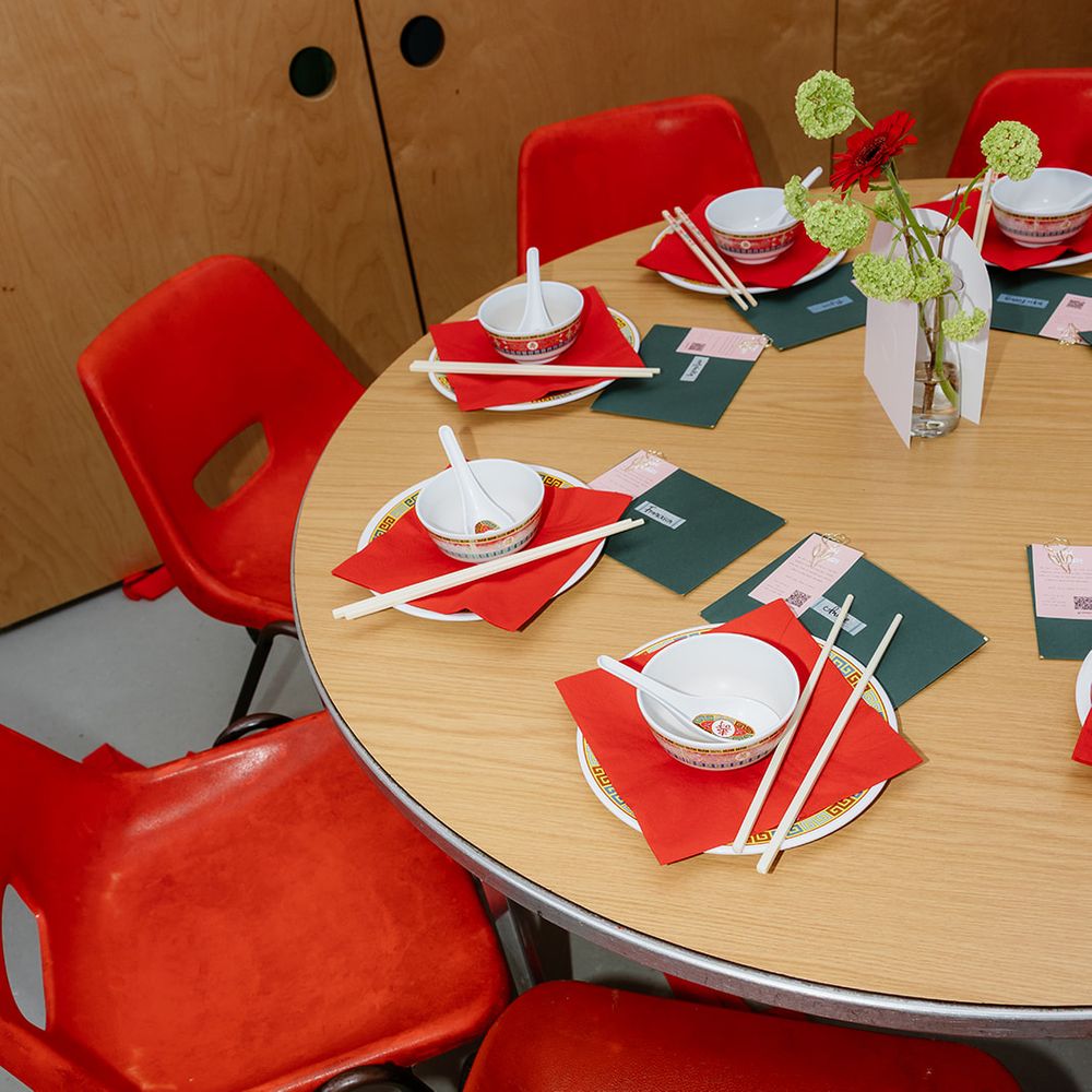 red table decor with chopsticks