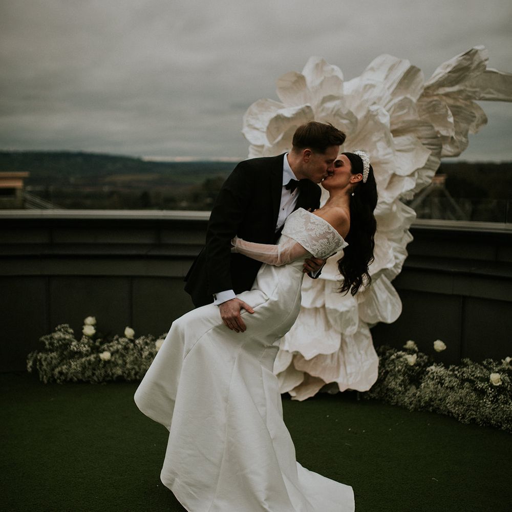 aisle kiss rooftop wedding 