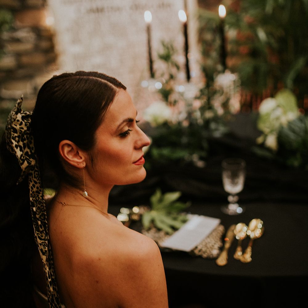 bride with leopard bow hair