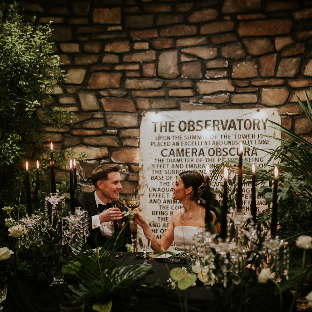 couple cheers glasses