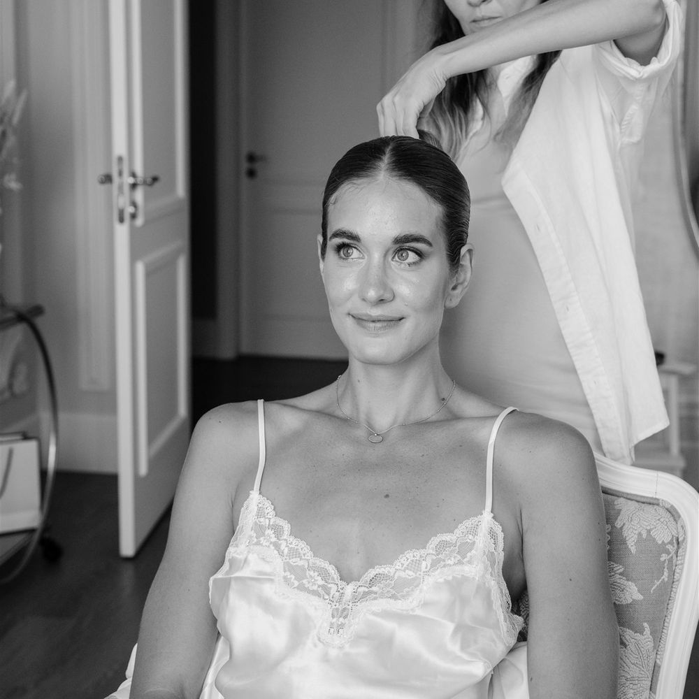 bride getting ready in silk pyjamas