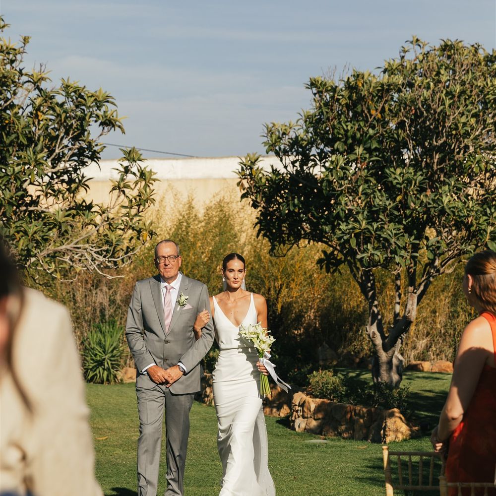 bride walked down the aisle by father