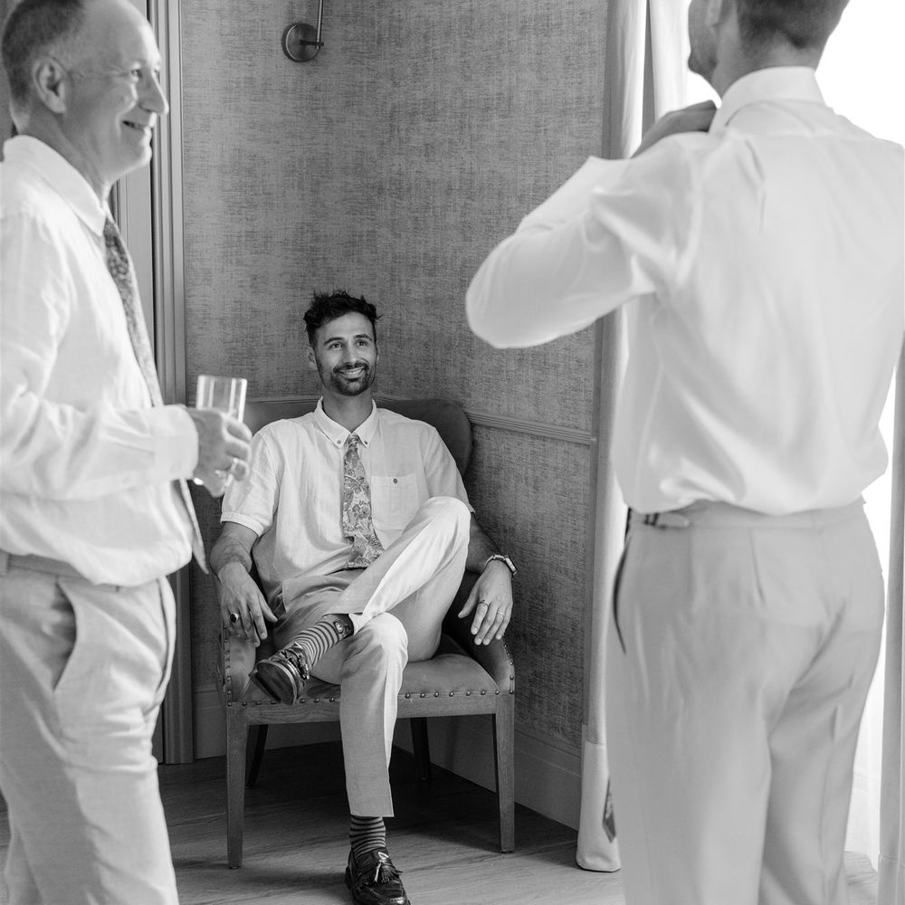 groomsmen getting dressed