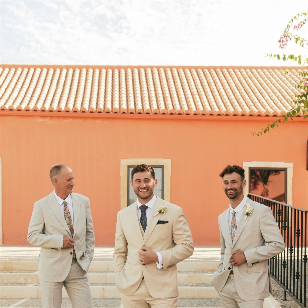 groomsmen in beige suits