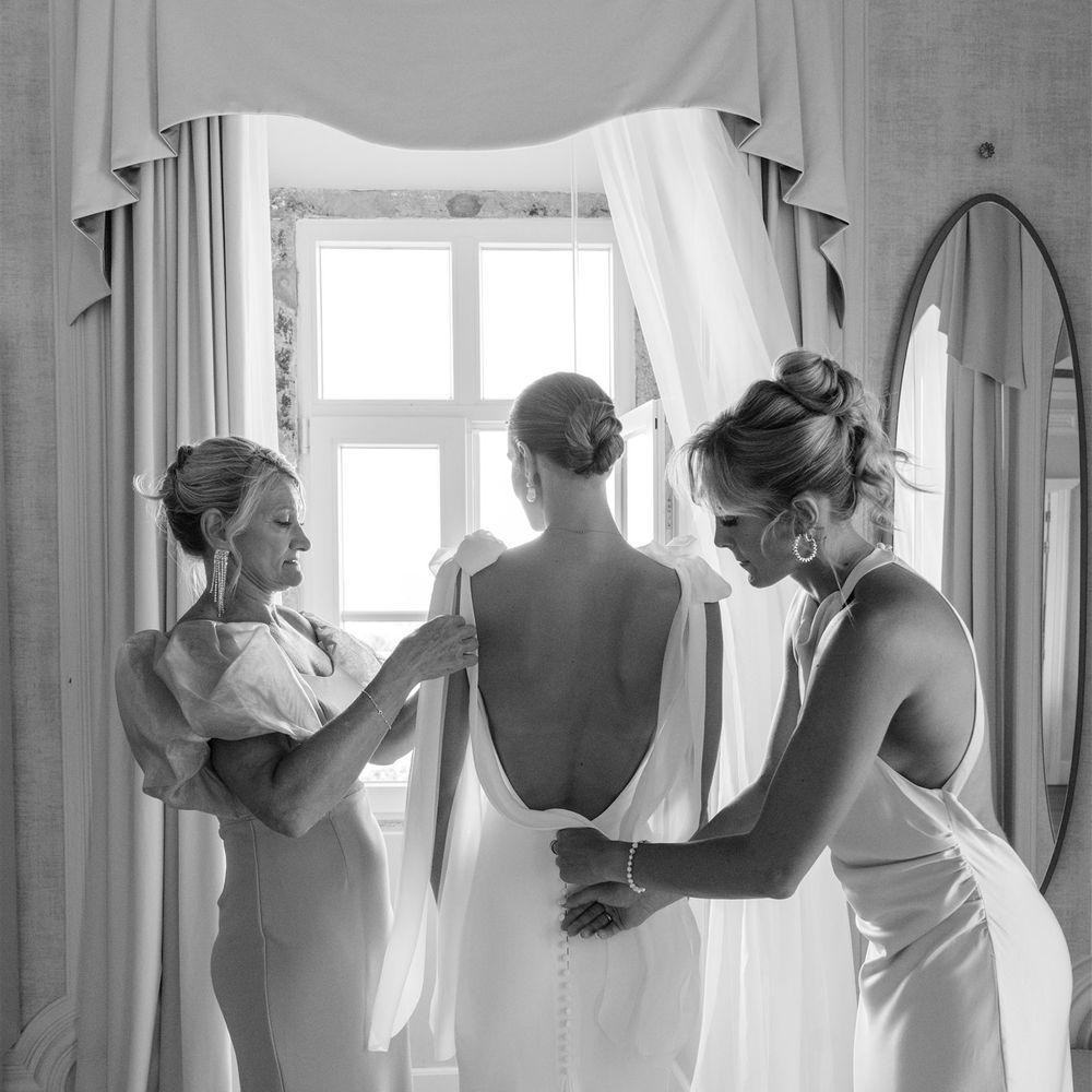 low back wedding dress getting ready