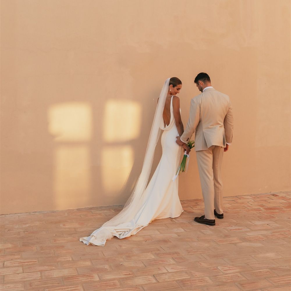 married couple pose in portugal wedding