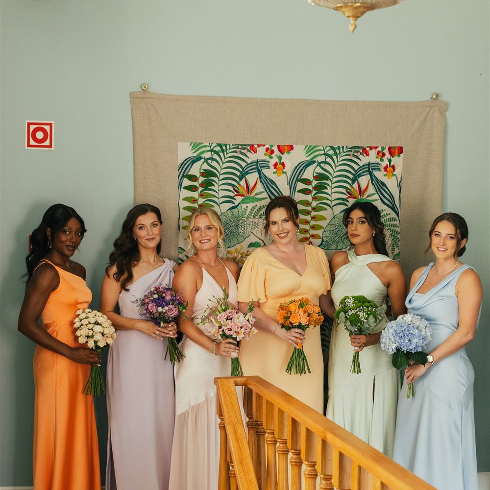 pastel bridesmaid dresses with matching bouquets