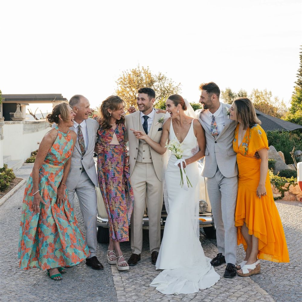 wedding guests with married couple