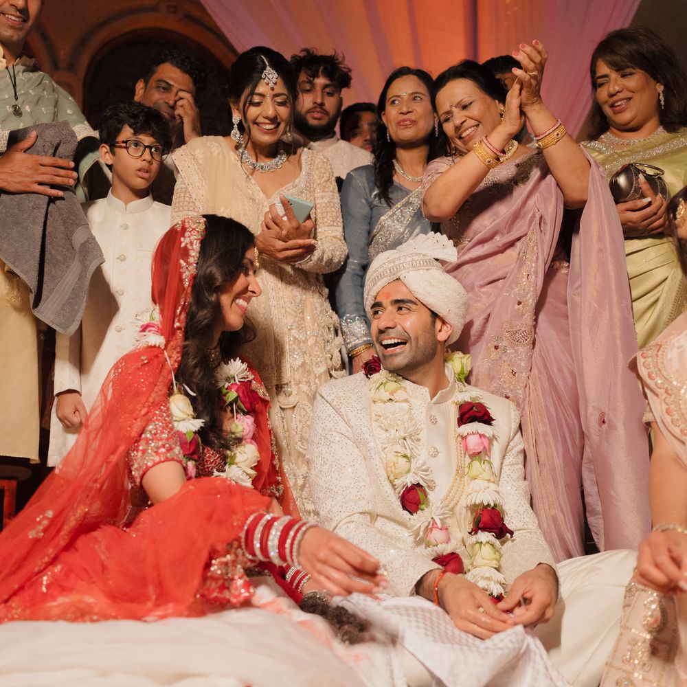bride and groom wearing marigolds