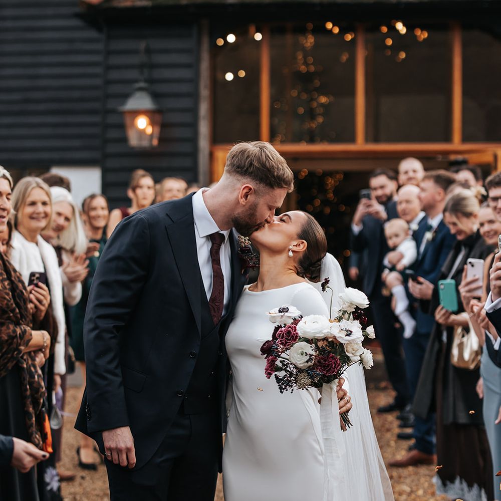 burgundy details confetti walk kiss