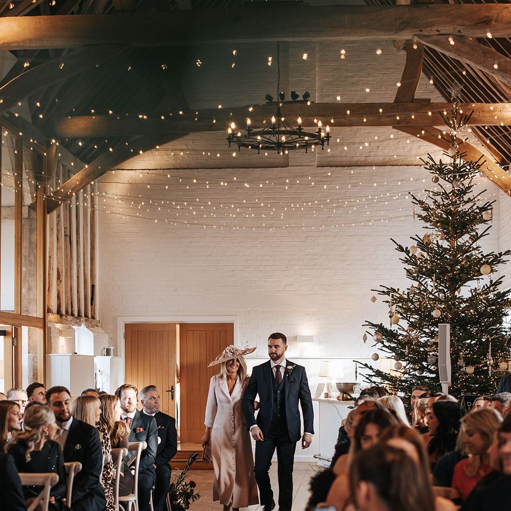 groom walking down the aisle christmas tree decor