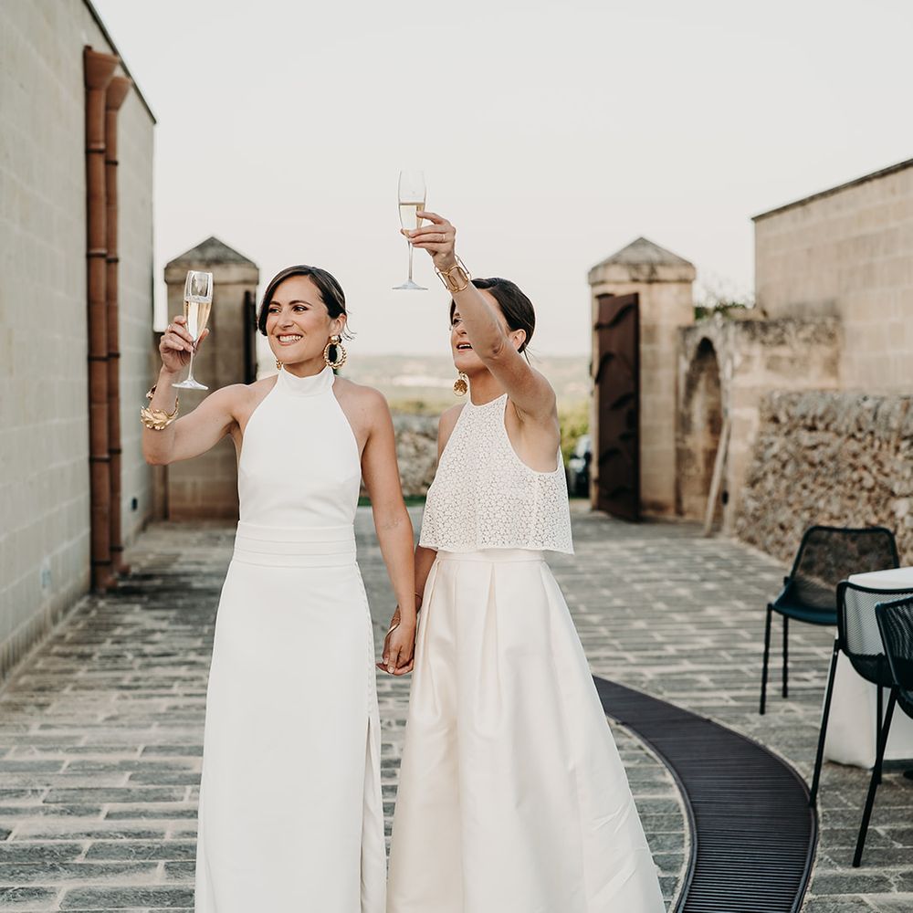 brides arriving at reception cheers