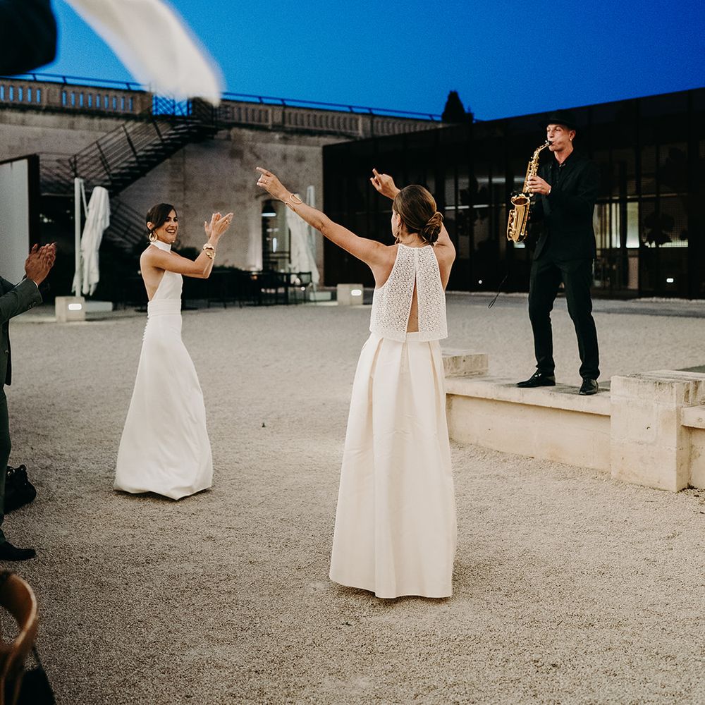 brides dancing to live saxophonist 