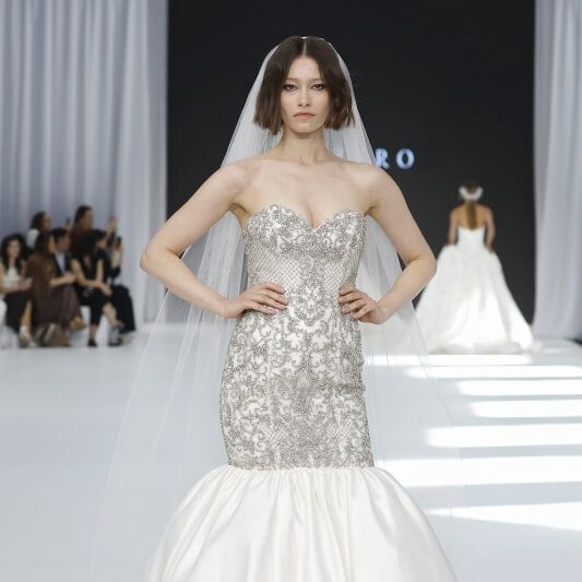 Lazaro Maison Perez mermaid wedding dress with beaded bodice and satin skirt on the runway at Barcelona Bridal Fashion Week 2026