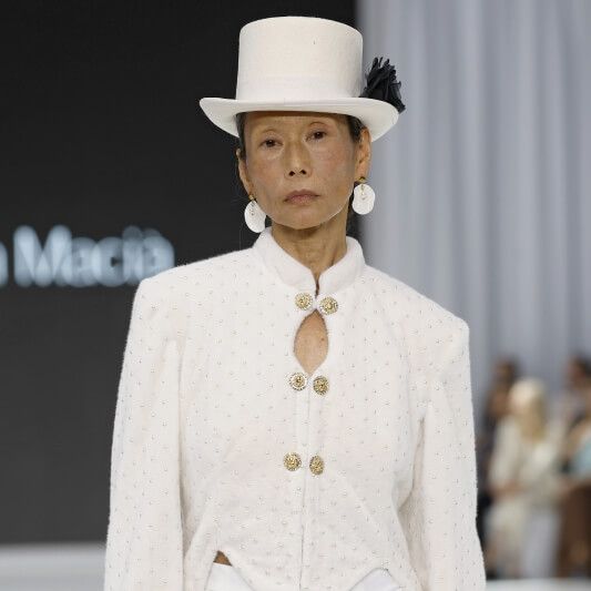 Olga Macia bridal suit with tailored jacket, trousers and top hat at Barcelona Bridal Fashion Week 2026