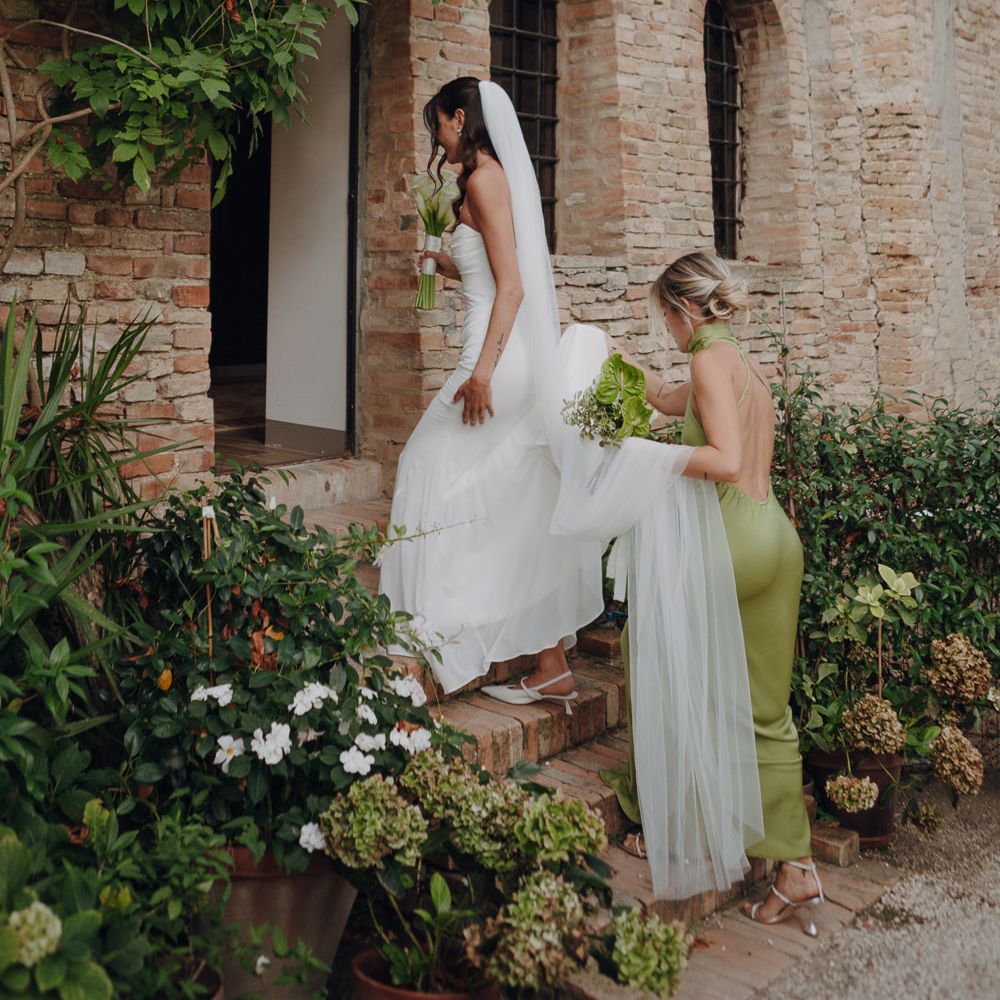 bride entrance stone steps cathedral veil rustic italian venu