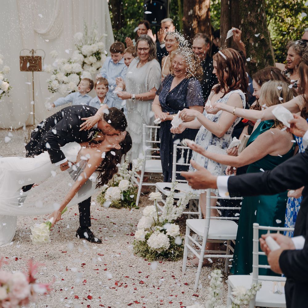 confetti dip kiss wedding ceremony just married