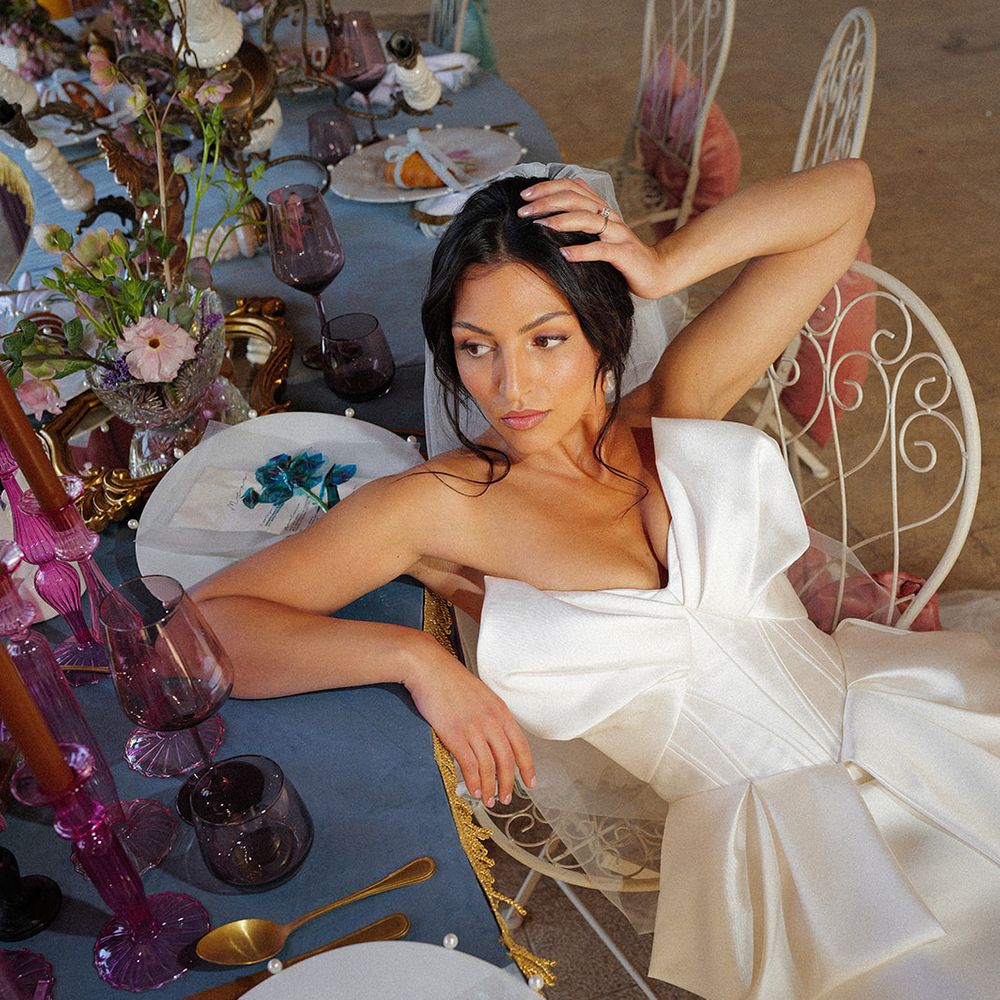 modern bride bow detail dress colourful tablescape