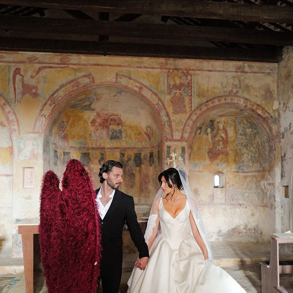 statement red feather wings wedding editorial fashion