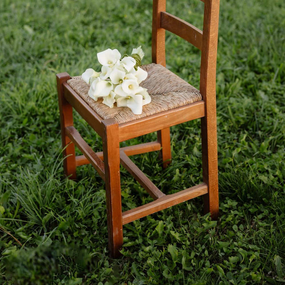 lillies bouquet wooden chair intimate wedding