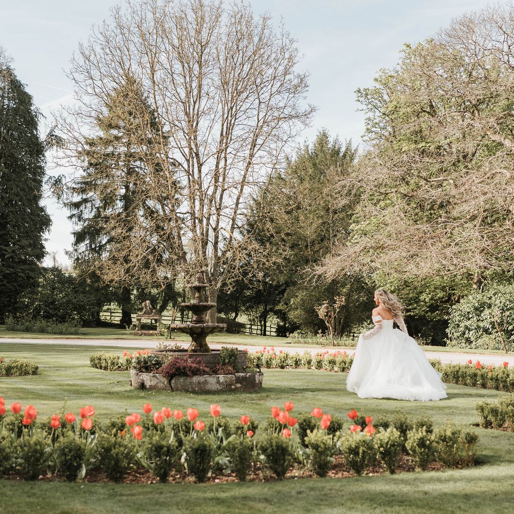 bride dancing castle gardens tulips