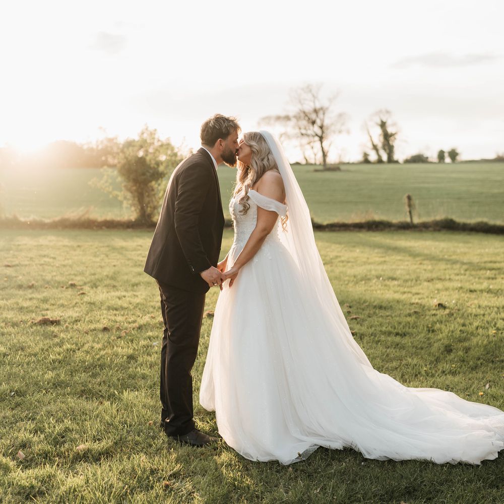 clearwell castle garden grounds couple share kiss