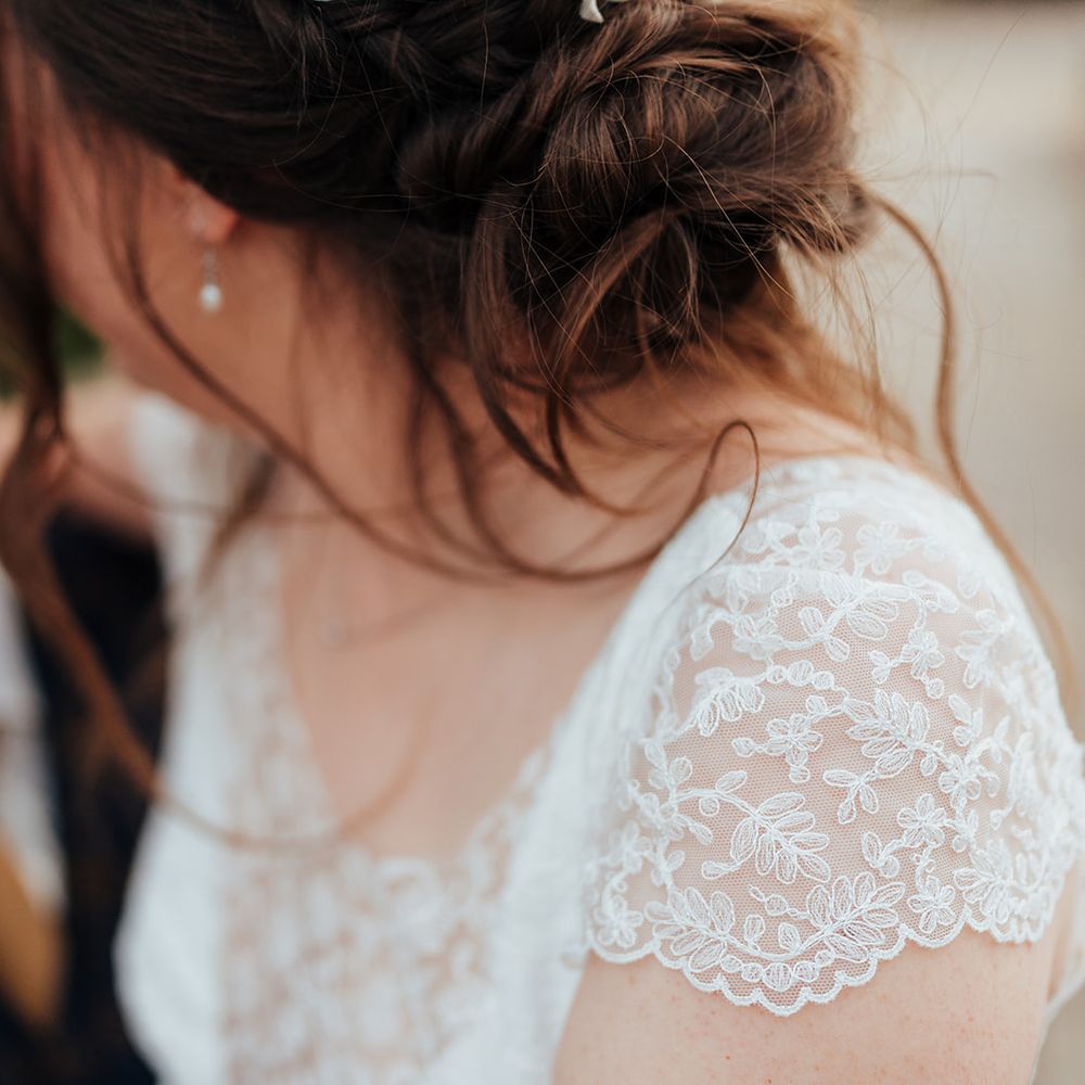 bride cap sleeve lace detail wedding dress