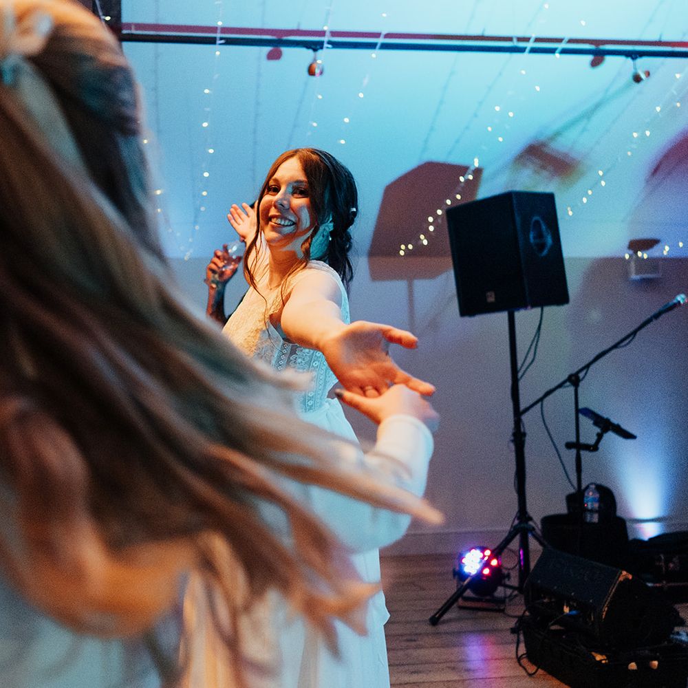 bride dancing party fairy lights