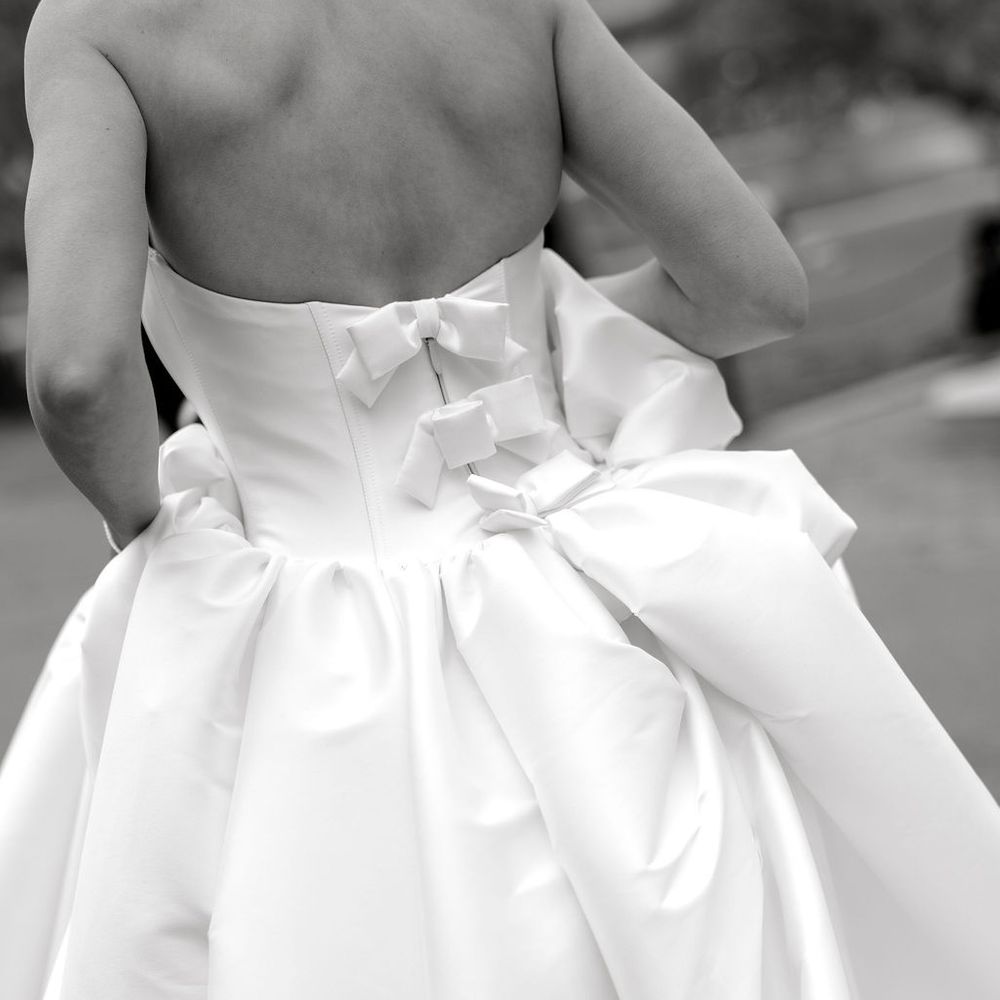 basque waist bow detail wedding gown