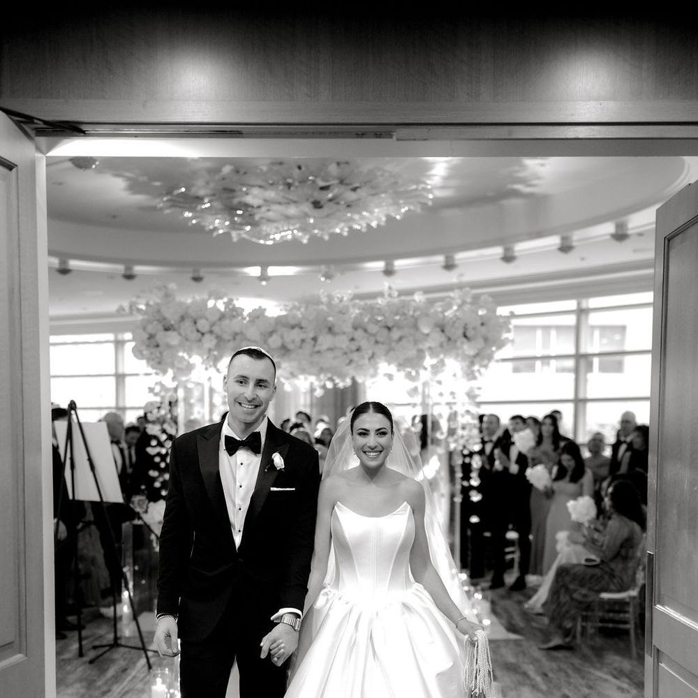 bride groom just married exit smiling