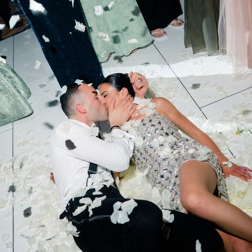 married couple traditional persian flower toss