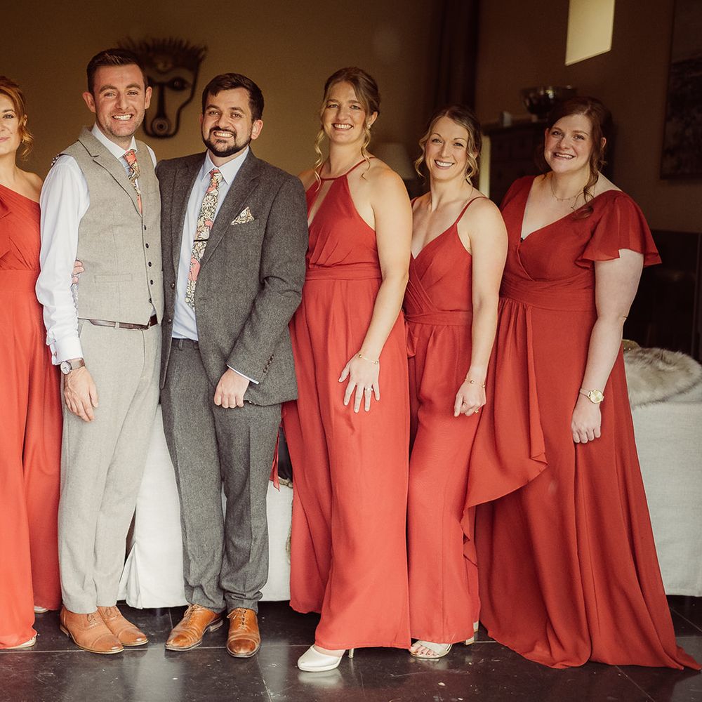 grooms bridesmaids red matching bridesmaids dresses