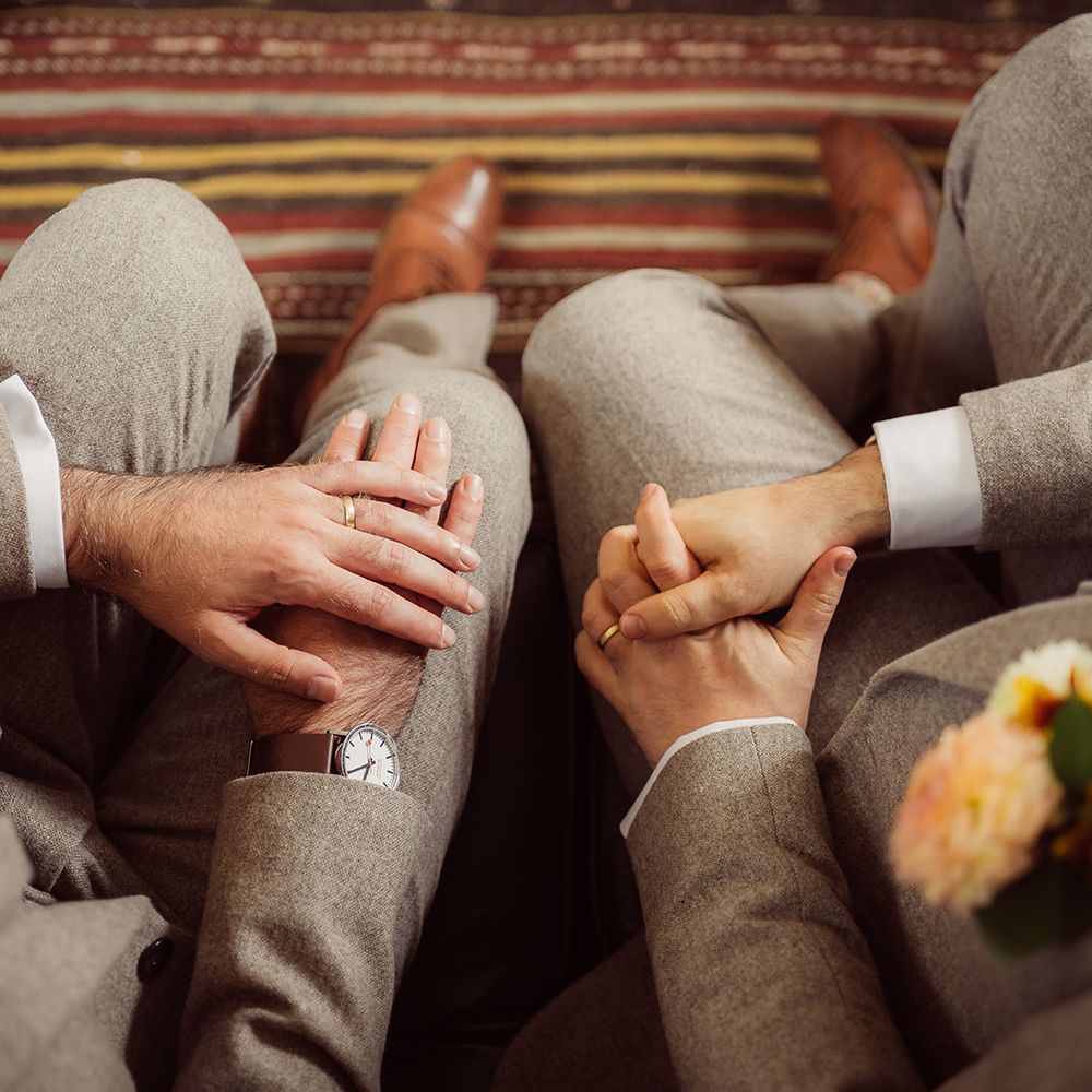 grooms married show wedding rings