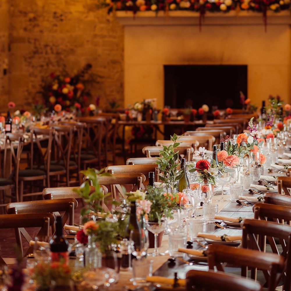 orange accent floral reception decor big disco ball