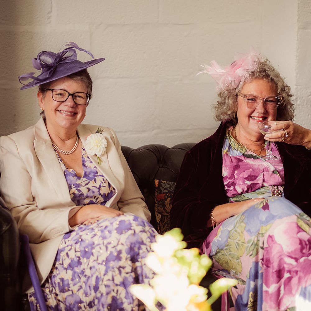 wedding guests floral dresses pastel fascinators