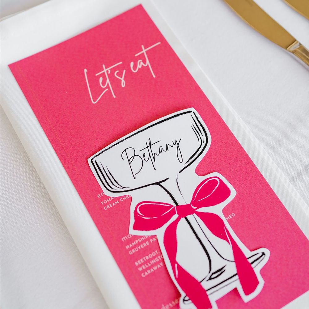 Cute cocktail place name card with hot pink bow