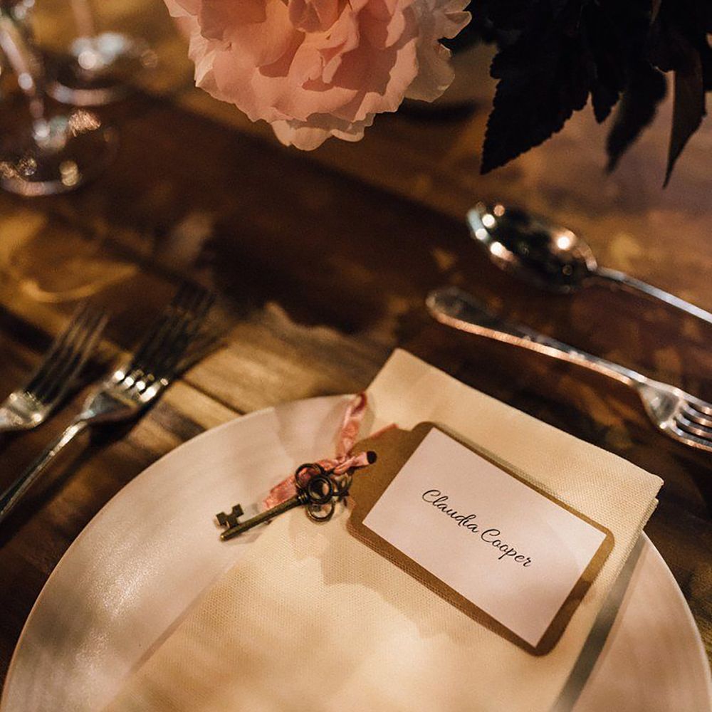Wedding place name setting with blush flowers