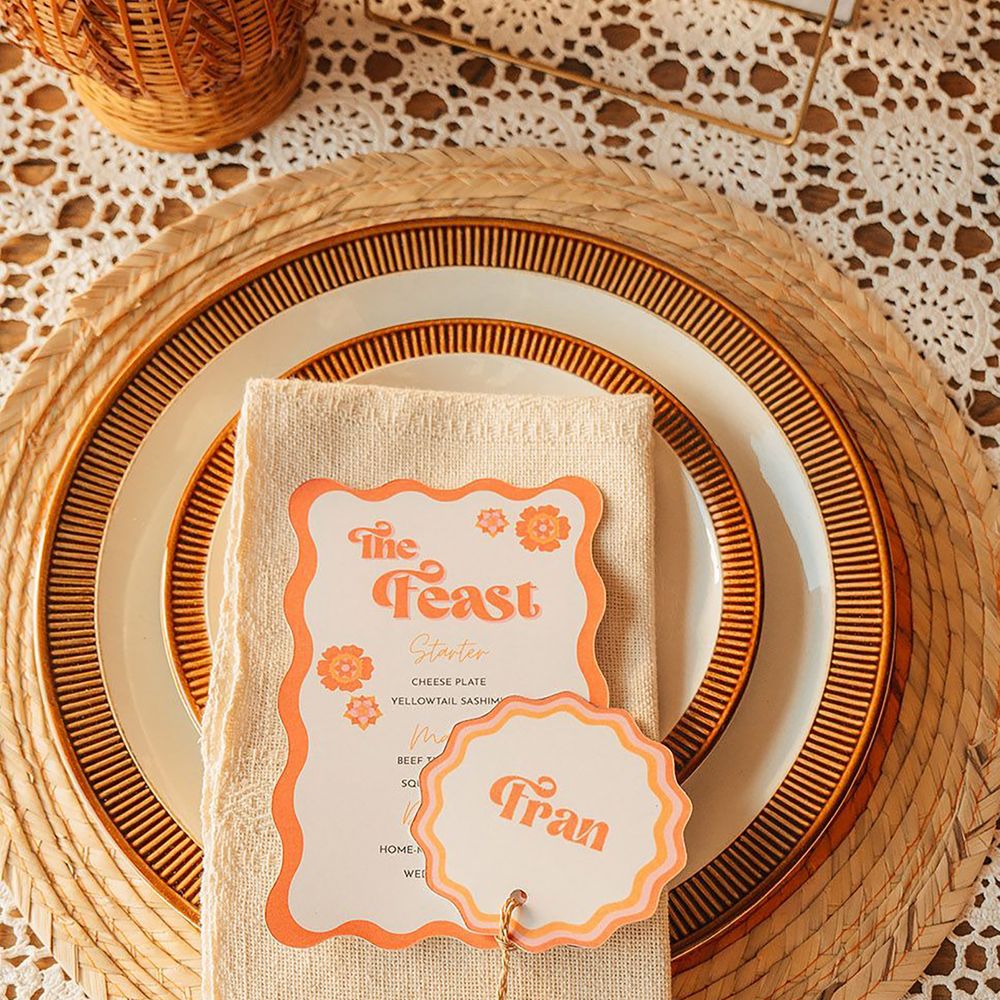Wicker place mat with retro orange and white wedding place names 