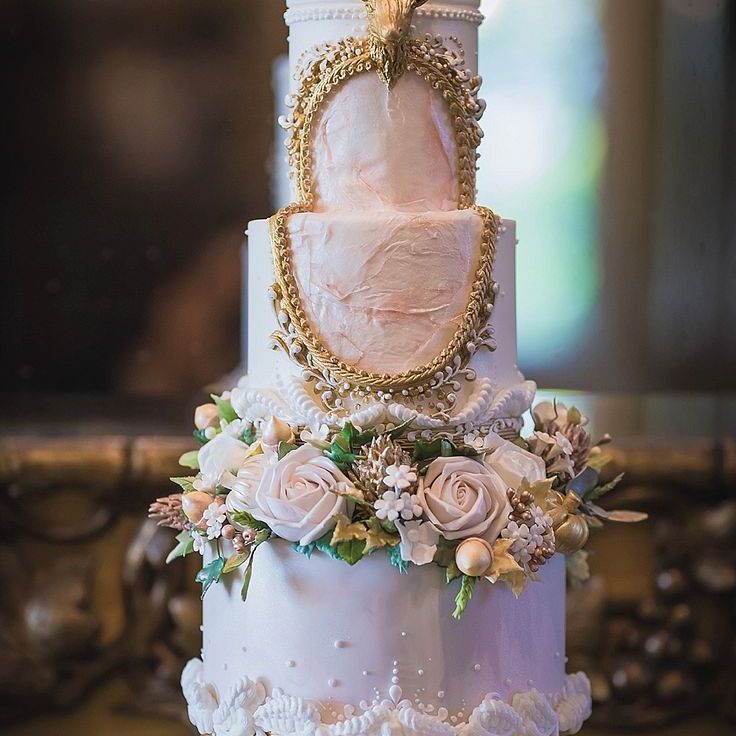 Pink and gold whimsical wedding cake