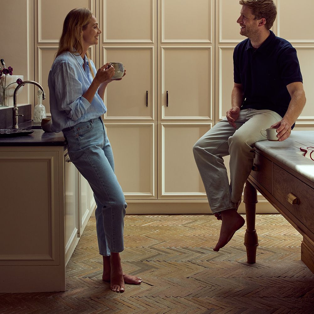 couple-chats-in-their-kitchen-the-wedding-shop-gift-registry