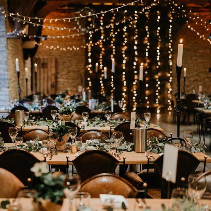 Tythe Barn wedding with cosy lighting 