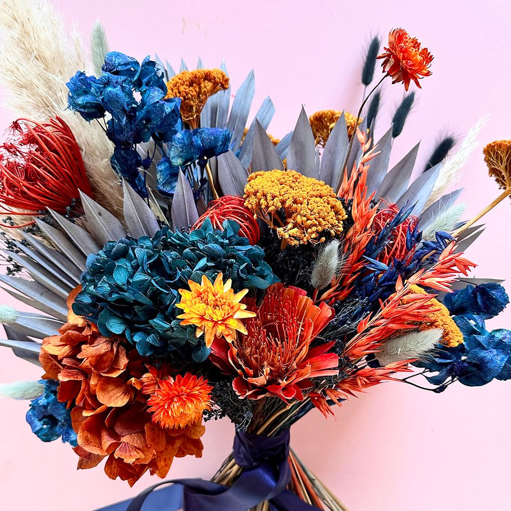 Horseshoe Flowers dried flower bouquet with blue and orange tones