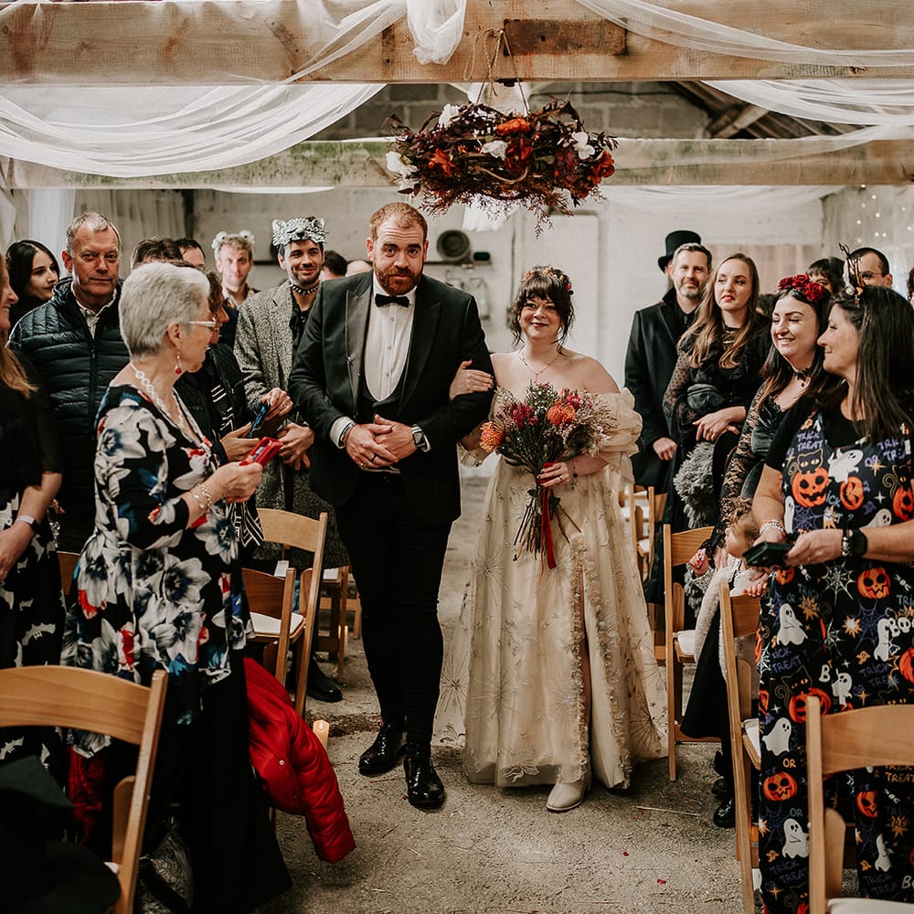bride aisle halloween costumed guests