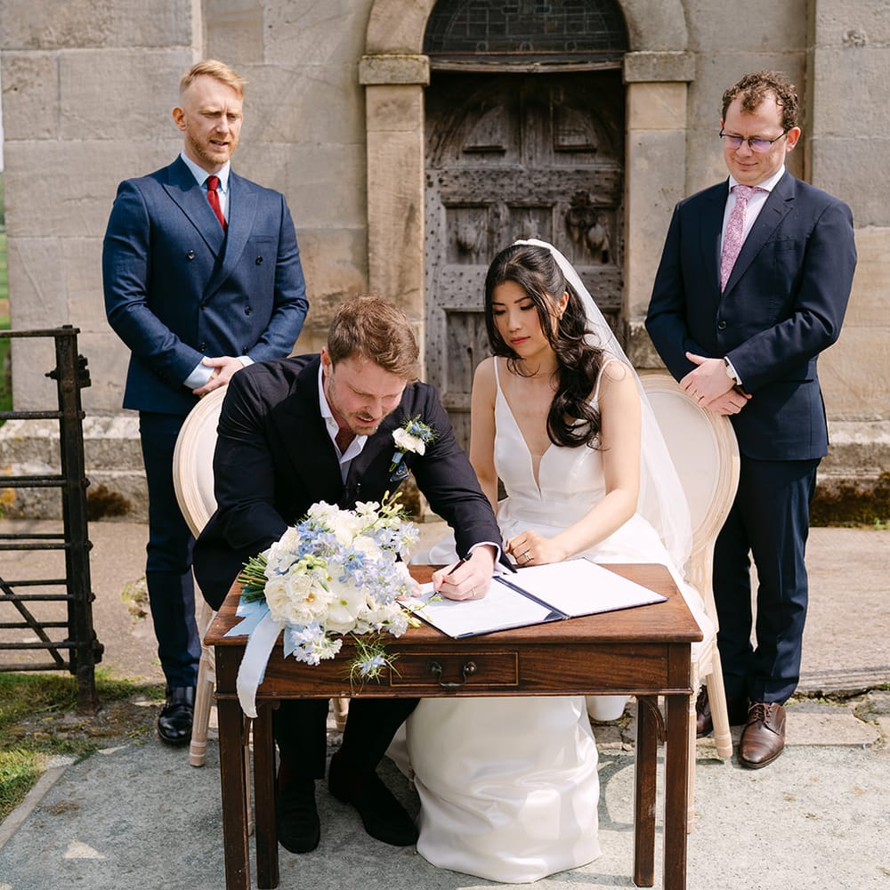 bride groom outdoor register signing