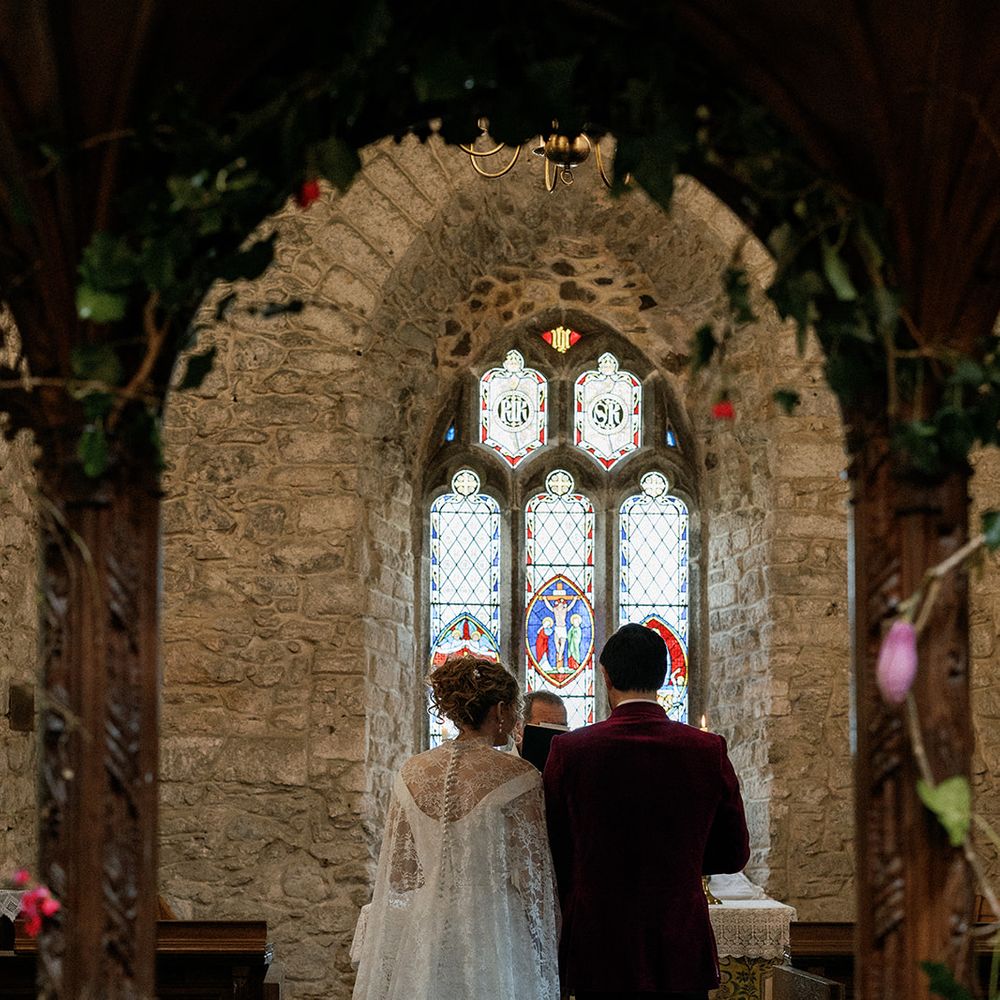 bride groom stained glass church altar