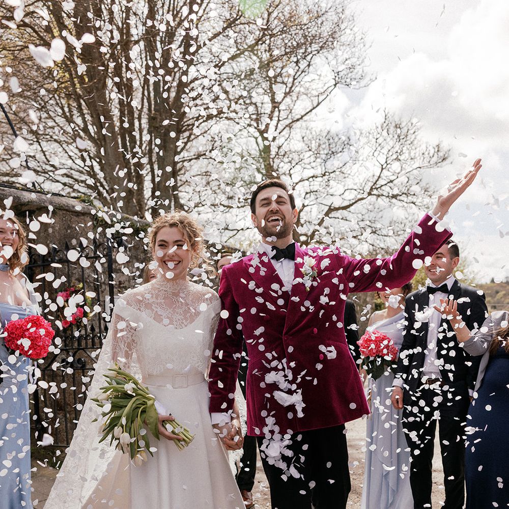 bride groom white confetti toss
