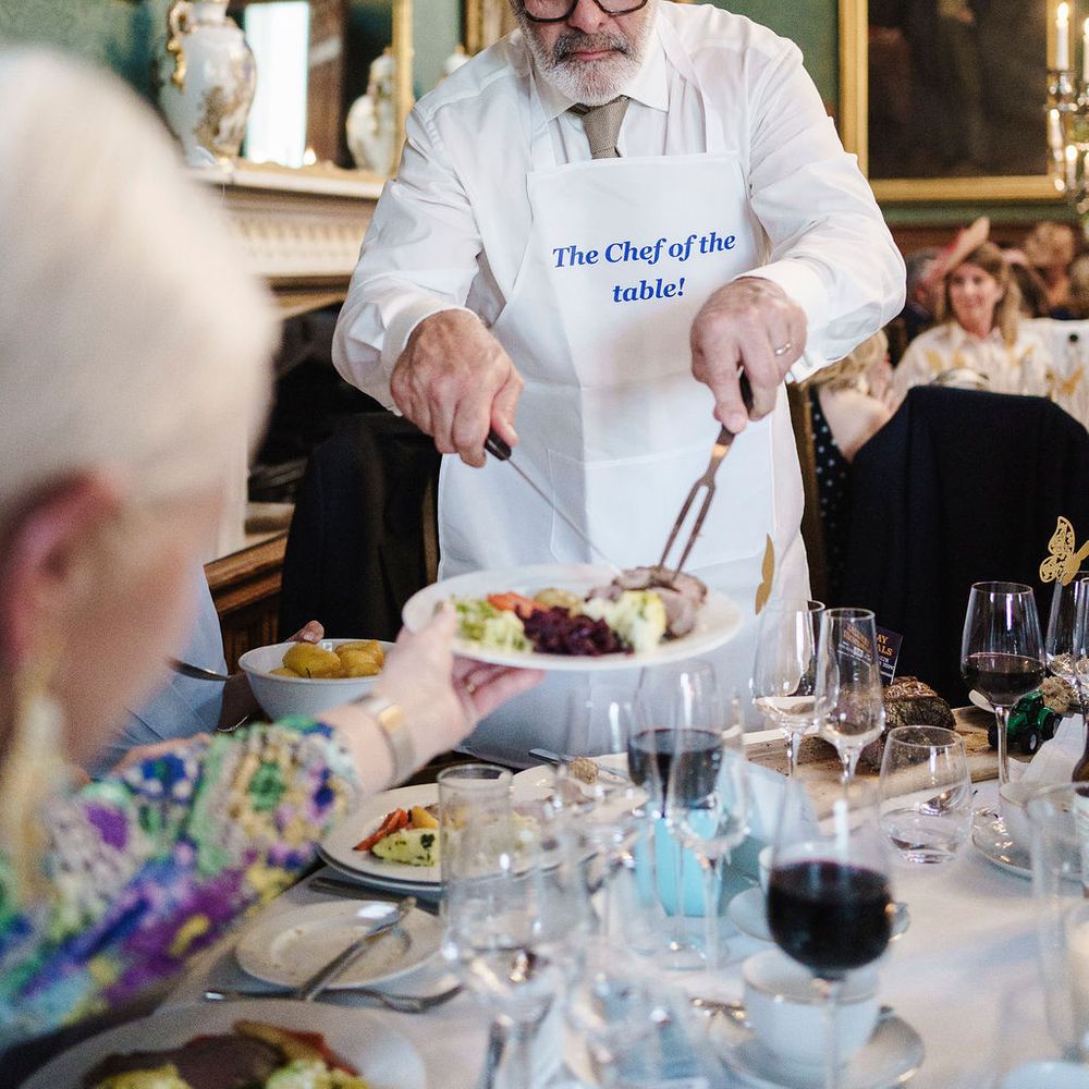 chef carving roast dinner