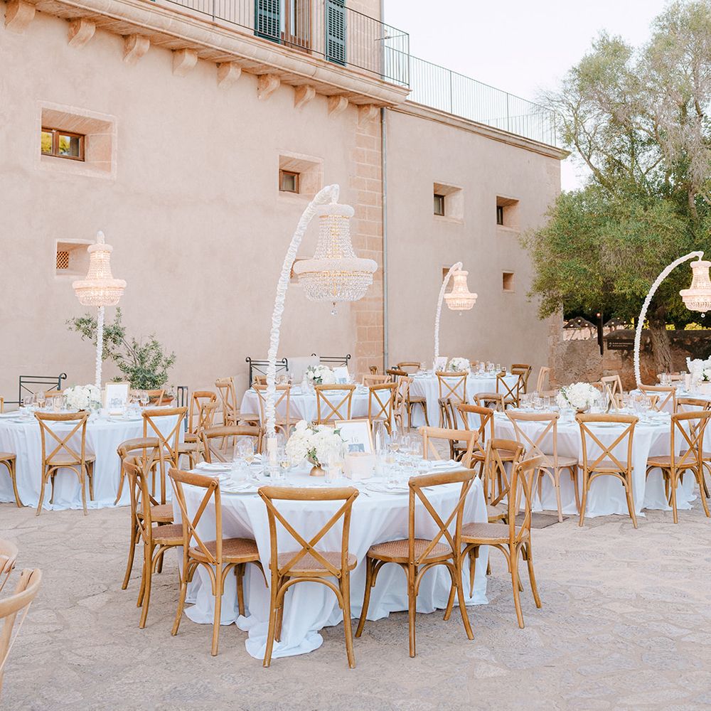 crossback chairs chandelier reception