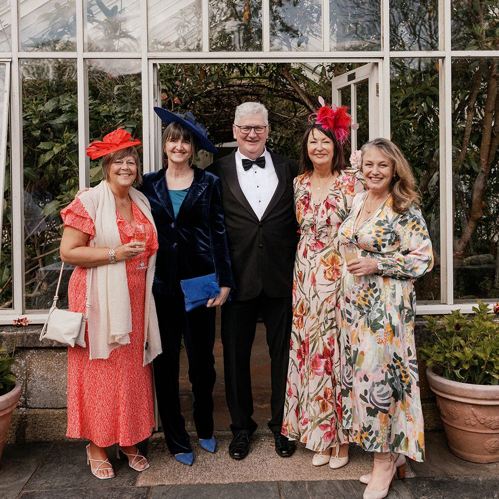guests colourful fascinators conservatory entrance