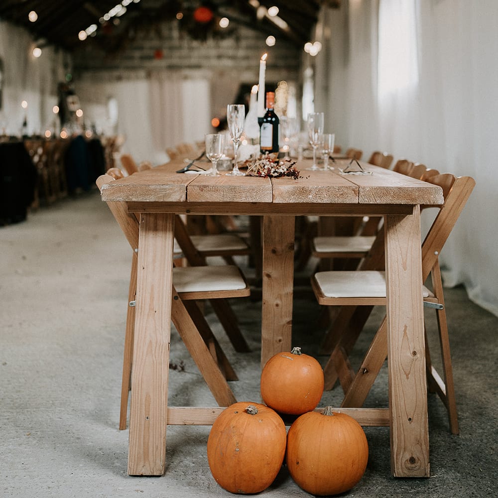 halloween reception table stacked pumpkins
